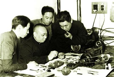 4 Technicians working on China's first watch